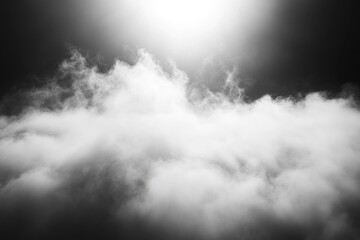 Dramatic sunlight breaking through dark clouds in monochrome sky