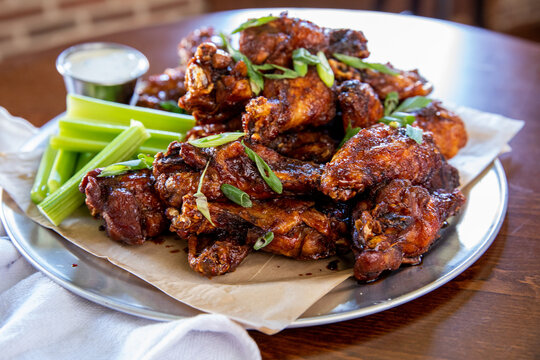 Platter of wings with celery and blue cheese 