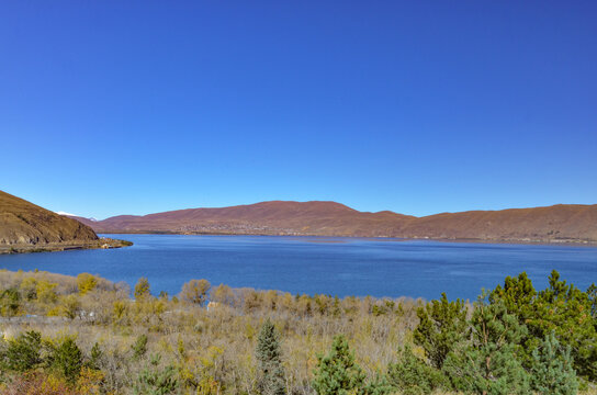 northern coast of Lake Sevan and Areguni mountain range scenic view from Sevanavank monastery (Gegharkunik Province, Armenia)