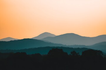 Obraz premium Layers of mountains at golden hour