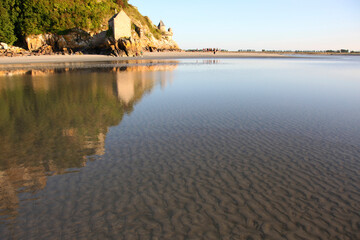 Mont Saint-Michel at low tides in Normandy, France