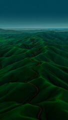 Fototapeta premium Serpentine Roads Winding Through Lush Green Hills An Aerial View of Rolling Landscapes