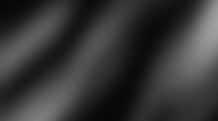 Smooth black textured background with soft gradient and noise