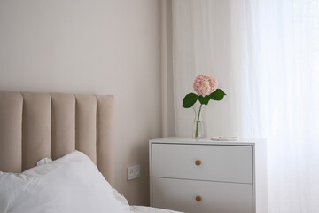 Create an Elegant Bedroom Decor that Features Soft Colors Paired with a Floral Touch