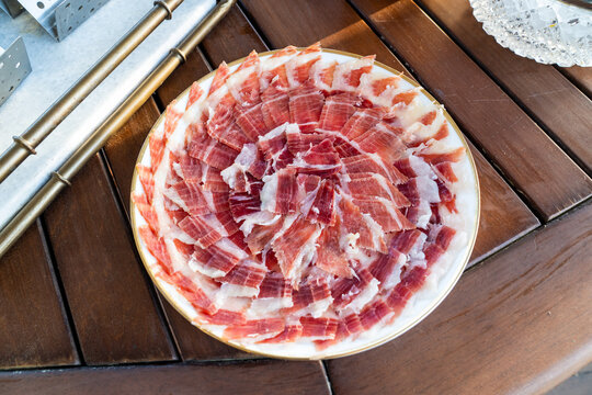 Jamon Serrano, spanish ham leg in holder 