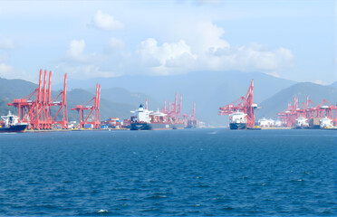Fototapeta premium Busy Scene of Port and Cargo Ships