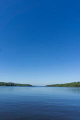 Tranquil View of Rødenessjøen Surrounded by Pine Forest in Norway
