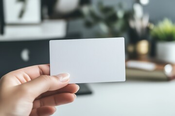 Obraz premium Hand Holding Blank Business Card Mockup Concept