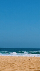 Sunlit Sand Meets Ocean