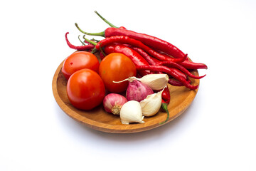 Red chili peppers and other spices to make chili paste. Chilli paste is a condiment made from...