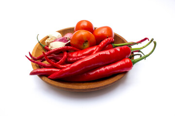 Red chili peppers and other spices to make chili paste. Chilli paste is a condiment made from...