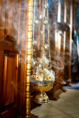Orthodox Church Censer Emitting Incense Smoke During Sacred Ceremony