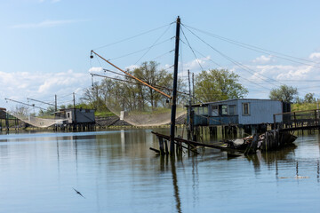 The trabucco. In Italian known in some southern dialects as trabocco or travocc, is an ancient fishing machine typical of the Adriatic shores