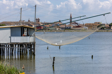 The trabucco. In Italian known in some southern dialects as trabocco or travocc, is an ancient fishing machine typical of the Adriatic shores
