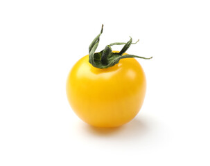 Ripe yellow cherry tomato isolated on white