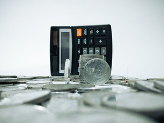 Indonesian coins and a calculator