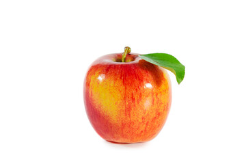 Shiny juicy red apple with leaf isolated on white background.