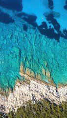 Clear Blue Sea and Rocky Shore