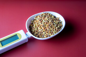 Bee Pollen Granules on Digital Scale