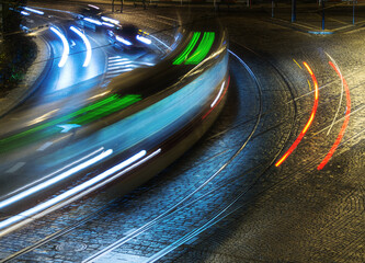 Blurred traffic on the night streets of Prague