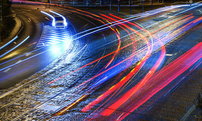 Blurred traffic on the night streets of Prague