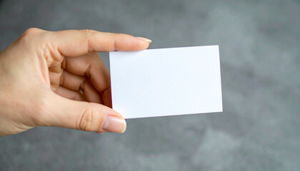 Female hands holding blank card mockup – personal message, social communication or creative design concept

