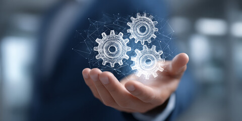 Hand holding three digital gears, interconnected by a network, symbolizing teamwork, synergy, and efficient workflow in business process