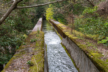 Water flowing over ancient aqueduct (Suirokaku) near the Nanzenji Temple, Kyoto, Japan built in the style of the Romans contstructed in Meiji Era with water transported from Lake Biwa to Kyoto