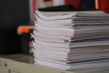 Close-Up of a Stack of Documents on an Office Desk