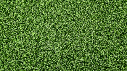Obraz premium Vibrant green artificial turf outdoor sports field textured surface natural environment aerial view recreation concept