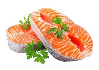 Two salmon fillets, fresh and vibrant orange-pink, are laid atop each other, garnished with sprigs of fresh parsley
