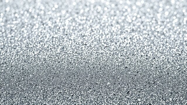 Grauer Glitzerhintergrund mit vielen kleinen funkelnden Lichtpunkten, ideal f&uuml;r elegante Designs.