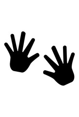 Obraz premium Black handprints, possibly footprints. English: Silhouettes of two open palms
