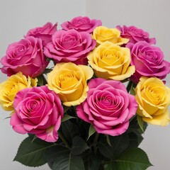 Fototapeta premium Colorful Arrangement of Pink and Yellow Roses in a Bright Bouquet