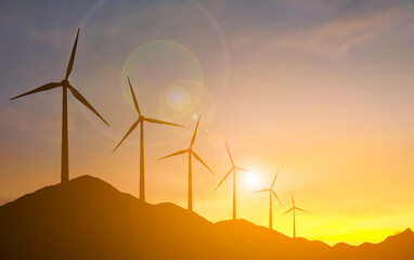 Silhouette wind turbine field on the high mountain