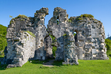 Ruins of an ancient Orthodox church from the 9th century close-up on a sunny May day. Bzypta, Abkhazia