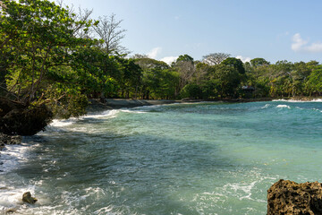 tropical beach with turquoise water in caribbean sea in capurgana choco colombia landscape panorama