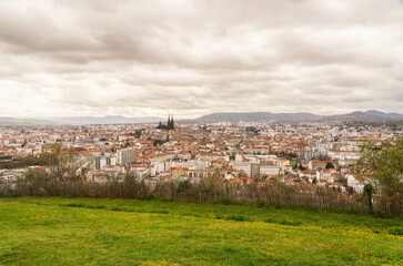 panorama of the city of Clermont Ferrand landscape with cathedral church and volcan mountains in auvergne france