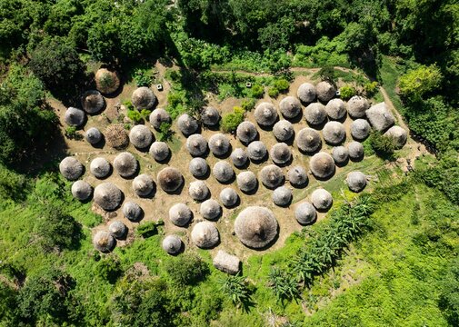 Aerial view of the Tayrona Kogui Wiwa indigenous village with thatched and palm huts in the middle of the Sierra Nevada de Santa Marta in Colombia