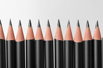 Many sharp graphite pencil isolated on white