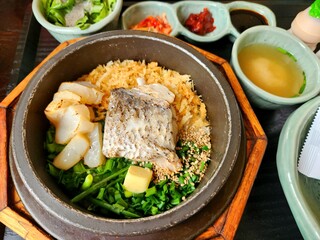 Korean sea bream cauldron pot rice served with scallops