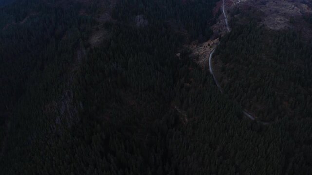 Establishing aerial footage of a small town in the mountains
