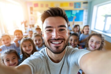 Obraz premium Young Male Teacher Taking Joyful Classroom Selfie