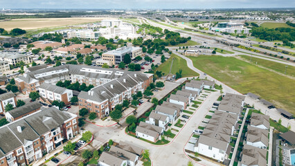 Highway overpass Sam Rayburn Tollway intersection in mixed use development of multi-use healthcare medical, commercial, business, institutional and residential uses in McKinney Medical District