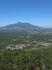 The landscape with a volcano in the center seen from the abbey of Visciano in the province of Naples, Italy.