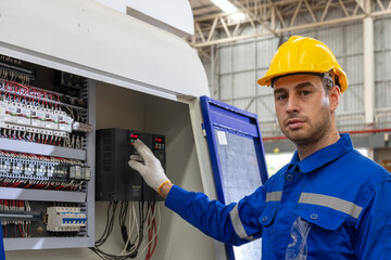Construction electrician engineer caucasian male working with laptop in concept of good management...