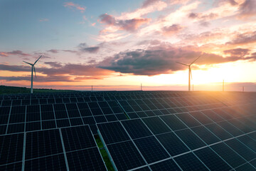 Wind turbines and solar parks are two adopted renewable energy technologies used to generate electricity sustainably. Green energy reduces pollution and keeps the environment clean and sustainable.