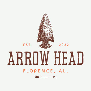 Vintage flint stone arrowhead and spearhead in hand drawn illustration style for outdoor activity related like hunting and camping logo design template