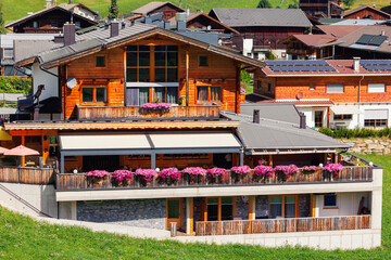 Scenic aerial alpine view austrian mountain village Kals am Grossglockner valley green rural farmland meadow horse pasture background. Austria Alp osttirol National park nature. Summer hiking tourism