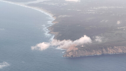 Coastal Libon serenity draped in morning mist, whispering of cloud festivals and ancient maritime...
